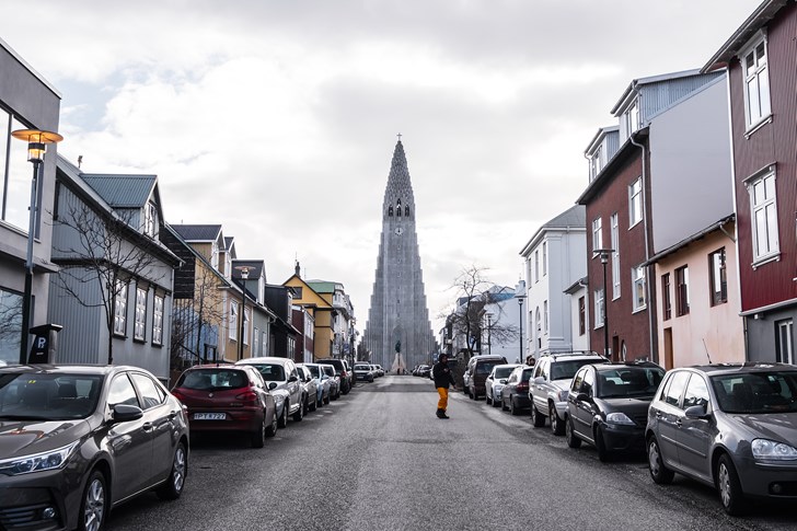 Cars parked along a road in Reykjavik.