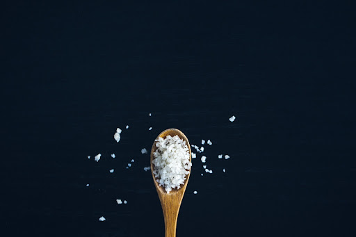 Sea salt on a wooden spoon