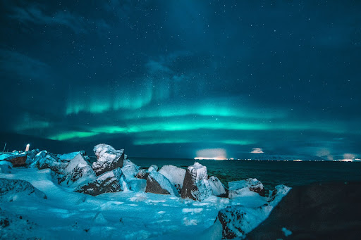 Northern lights across the sea in Iceland 